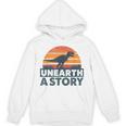 Unearth A Story Dinosaur Reader Book Lover 2026 Unisex Hoodie Unearth A Story Dinosaur Reader Book Lover 2026 Unisex Hoodie