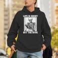 Life Is Short Buy The Book Skeleton Reading Book Unisex Hoodie Life Is Short Buy The Book Skeleton Reading Book Unisex Hoodie