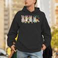 Women's Group Bunny Corgis Easter Reading Book Hunting Eggs Owner Unisex Hoodie