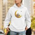 Astronaut Reading Book To Alien Moon Space Astronomy Unisex Hoodie
