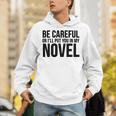 Be Careful Or I'Ll Put You In My Novel Book Author Unisex Hoodie