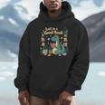 Lost In a Good Book Cute Reading Dinosaur Illustration Unisex Hoodie Lost In a Good Book Cute Reading Dinosaur Illustration Unisex Hoodie