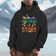 Summer Reading 2026 Dinosaurs Book Lover Unearth A Story Unisex Hoodie