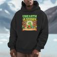Unearth A Story Dinosaur Summer Reading 2026 Books Unisex Hoodie Unearth A Story Dinosaur Summer Reading 2026 Books Unisex Hoodie
