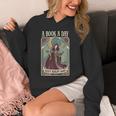 A Book a Day Keeps Reality Away Fairy Reading Tarot Card Unisex Hoodie