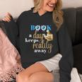 A Book A Day Keeps Reality Away Keep Your Day Dream Unisex Hoodie