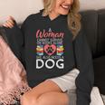 A Woman Cannot Survive On Books Alone She Also Needs a Dog Unisex Hoodie A Woman Cannot Survive On Books Alone She Also Needs a Dog Unisex Hoodie