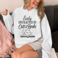 Easily Distracted By Cats & Books Cute Cat Book Lover Unisex Hoodie Easily Distracted By Cats & Books Cute Cat Book Lover Unisex Hoodie