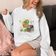 Unearth a Story Triceratops Dinosaur Reading Books Cute Dino Premium Tri-Blend Unisex Hoodie