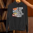 A Book A Day Keeps Reality Away Bookworm Unisex Hoodie A Book A Day Keeps Reality Away Bookworm Unisex Hoodie