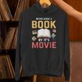 Never Judge A Book By It's Movie Reading Unisex Hoodie Never Judge A Book By It's Movie Reading Unisex Hoodie