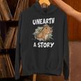 Unearth A Story Summer Reading Program 2026 Capybara Book Unisex Hoodie