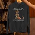 A Woman Cannot Survive On Books Alone She Also Needs Dogs Unisex Hoodie A Woman Cannot Survive On Books Alone She Also Needs Dogs Unisex Hoodie