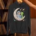Women's Astronaut Reading Book With Alien Moon Space Astronomy Unisex Hoodie Women's Astronaut Reading Book With Alien Moon Space Astronomy Unisex Hoodie