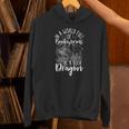 IN A WORLD FULL OF BOOKWORMS BE A Book Dragon Reader Unisex Hoodie