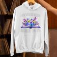 A New Chapter Begins Retired 2025 Floral Book Retirement Unisex Hoodie A New Chapter Begins Retired 2025 Floral Book Retirement Unisex Hoodie