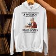 Never Underestimate A Woman Who Still Reads Books In Her Unisex Hoodie