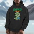 Women's Unearth a Story Summer Reading 2026 Triceratops Dino Book Men Hoodie Women's Unearth a Story Summer Reading 2026 Triceratops Dino Book Men Hoodie