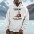 Never Underestimate A Woman Who Still Reads Books In Her Men Hoodie