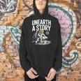 Unearth A Story Astronaut Finds Book On The Moon Men Hoodie Unearth A Story Astronaut Finds Book On The Moon Men Hoodie