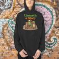 Women's Unearth a Story Summer 2026 Dinosaur Reading Books Dino Men Hoodie Women's Unearth a Story Summer 2026 Dinosaur Reading Books Dino Men Hoodie