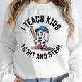 I Teach Kids To Hit And Steal Baseball Softball Coach Unisex Sweatshirt I Teach Kids To Hit And Steal Baseball Softball Coach Unisex Sweatshirt