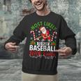 Most Likely To Play Baseball With Santa Christmas Pajamas Unisex Sweatshirt