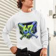 Awesome 67 Baseball Drip Effect Baseball 6-7 Meme Graphic Premium Tri-Blend Unisex Long Sleeve T-Shirt Awesome 67 Baseball Drip Effect Baseball 6-7 Meme Graphic Premium Tri-Blend Unisex Long Sleeve T-Shirt