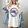 Lynyrd Skynyrd Skeleton Baseball Gun US Flag Cowboy Rock Fan Women's Comfort Colors T-Shirt Ivory Lynyrd Skynyrd Skeleton Baseball Gun US Flag Cowboy Rock Fan Women's Comfort Colors T-Shirt Ivory