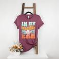In My Baseball Mom Era Retro Groovy Style Sports Mama Women's Heather T-Shirt Heather Maroon