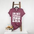 Family Mama In My Baseball Mom Era Women's Heather T-Shirt Heather Maroon Family Mama In My Baseball Mom Era Women's Heather T-Shirt Heather Maroon