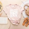 In My Baseball Mom Era Baseball Mama Groovy Sports Parent Women's Heather T-Shirt Heather Peach In My Baseball Mom Era Baseball Mama Groovy Sports Parent Women's Heather T-Shirt Heather Peach