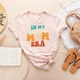 In My Baseball Mom Era Baseball Retro Groovy Mom Women's Heather T-Shirt Heather Peach