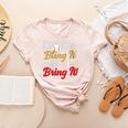 Baseball Moms Bling It & Their Sons Bring It For Women Women's Heather T-Shirt Heather Peach Baseball Moms Bling It & Their Sons Bring It For Women Women's Heather T-Shirt Heather Peach