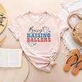 Busy Raising Ballers Retro Groovy Baseball Mom Outfit Women's Heather T-Shirt Heather Peach Busy Raising Ballers Retro Groovy Baseball Mom Outfit Women's Heather T-Shirt Heather Peach