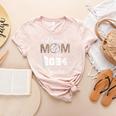 Proud Mom Of a 2024 Senior Class Of 2024 Baseball Mom Women's Heather T-Shirt Heather Peach