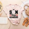 My Son Throws Harder Than Your Husband Baseball Mom Women's Heather T-Shirt Heather Peach