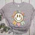 Happy Baseball Mom Groovy Retro Floral Smiling Face Women's Heather T-Shirt Athletic Heather Happy Baseball Mom Groovy Retro Floral Smiling Face Women's Heather T-Shirt Athletic Heather