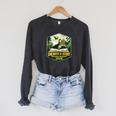 2026 Summer Reading Unearth a Story Teachers Students Book Raglan Sleeve Sweatshirt Dark Grey Heather