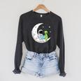Astronaut And Alien Reading On Moon Space Book Lover Sci Fi Raglan Sleeve Sweatshirt Dark Grey Heather
