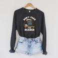 Don't Fear The Reader Kawaii Style Book Cartoon Raglan Sleeve Sweatshirt Dark Grey Heather