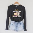 Easily Distracted By Cats And Books Bookworm Pet Lover Raglan Sleeve Sweatshirt Dark Grey Heather Easily Distracted By Cats And Books Bookworm Pet Lover Raglan Sleeve Sweatshirt Dark Grey Heather