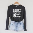 Easily Distracted By Cats And Books Books Cat Book Lover Raglan Sleeve Sweatshirt Dark Grey Heather