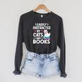 Easily Distracted By Cats And Books Cute Cat And Book Lovers Raglan Sleeve Sweatshirt Dark Grey Heather