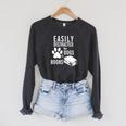 Easily Distracted By Dogs Books Reader Saying Raglan Sleeve Sweatshirt Dark Grey Heather