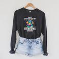 Easily Distracted By Dragons & Books Bookworm Library Raglan Sleeve Sweatshirt Dark Grey Heather Easily Distracted By Dragons & Books Bookworm Library Raglan Sleeve Sweatshirt Dark Grey Heather