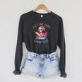Just One More Chapter Skeleton Reading Book Nerd Quote Raglan Sleeve Sweatshirt Dark Grey Heather