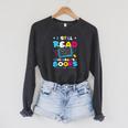 Kindergarten Teacher I Still Read Childrens Books Raglan Sleeve Sweatshirt Dark Grey Heather