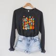 Library Squad Team Librarian Teacher Book Lover Retro Groovy Raglan Sleeve Sweatshirt Dark Grey Heather