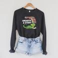 Summer Reading 2026 Unearth a Story Theme Dinosaur Book Nerd Raglan Sleeve Sweatshirt Dark Grey Heather